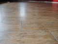 Porcelain-tile-that-looks-like-a-wood-floor-surface